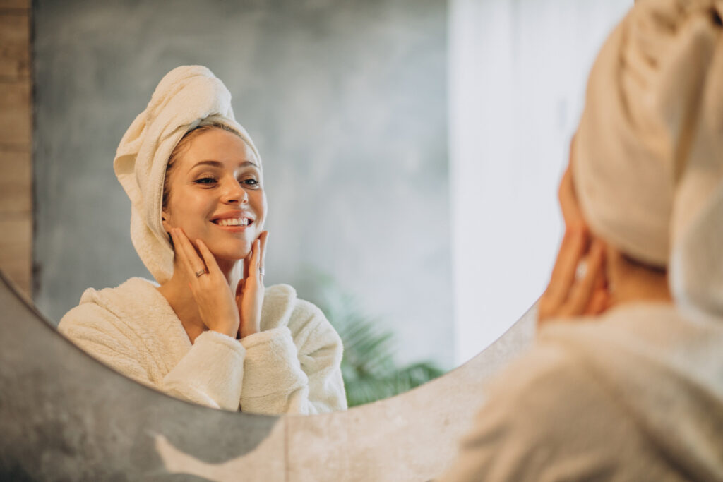 A woman enjoys a fresher face after our facials near Mansfield TX.
